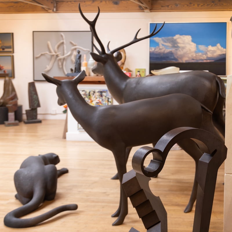 sculptures of deer and a jaguar
